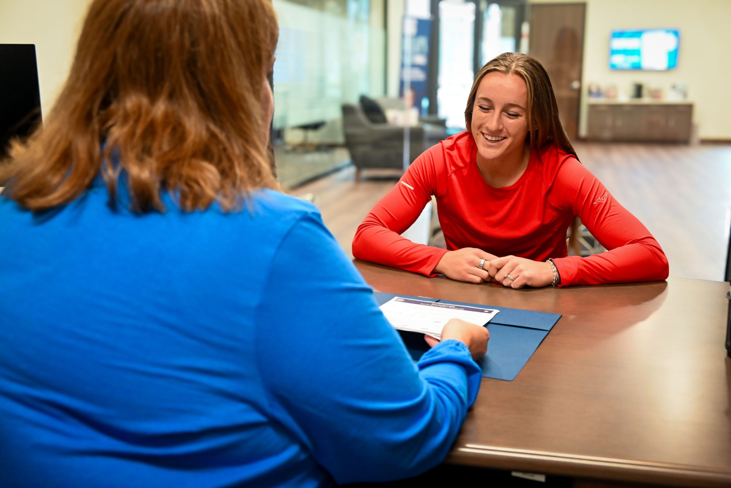 Jordy Frahm and Midwest Bank mortgage loan officer, Kristin Ling